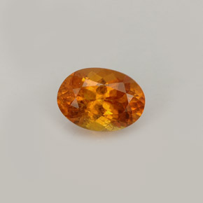 0,93 ctw natürlicher orangefarbener Clinohumit, Oval Schliff, VS-SI
