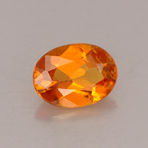 0,53 ctw natürlicher orangefarbener Clinohumit, Oval Schliff, VS