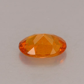 0,53 ctw natürlicher orangefarbener Clinohumit, Oval Schliff, VS