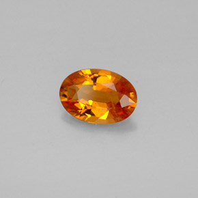0,93 ctw natürlicher orangefarbener Clinohumit, Oval Schliff, VS-SI