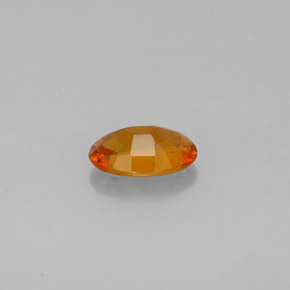 0,93 ctw natürlicher orangefarbener Clinohumit, Oval Schliff, VS-SI
