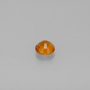 0,48 ctw natürlicher orangefarbener Clinohumit, Rundschliff, SI