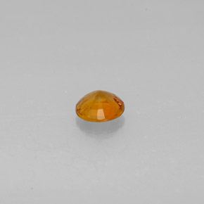 0,57 ctw natürlicher orangefarbener Clinohumit, Rundschliff, SI