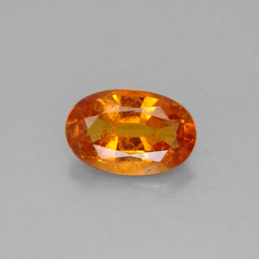 1,42 ctw natürlicher orangefarbener Clinohumit, Oval Schliff, SI