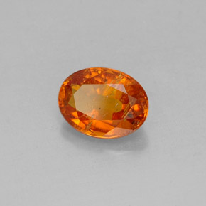 1,36 ctw natürlicher orangefarbener Clinohumit, Oval Schliff, SI
