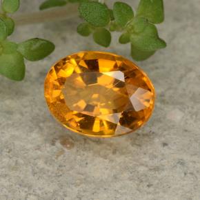 0,84 ctw natürlicher orangefarbener Clinohumit, Oval Schliff, VS-SI