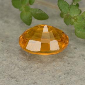 0,84 ctw natürlicher orangefarbener Clinohumit, Oval Schliff, VS-SI