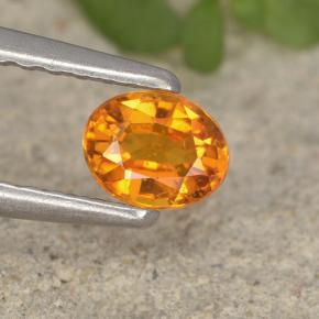 0,33 ctw natürlicher orangefarbener Clinohumit, Oval Schliff, VS-SI