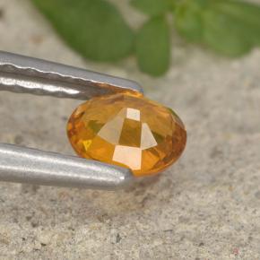 0,33 ctw natürlicher orangefarbener Clinohumit, Oval Schliff, VS-SI