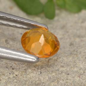 0,34 ctw natürlicher orangefarbener Clinohumit, Rundschliff, VS-SI