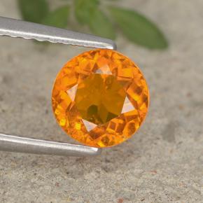 0,95 ctw natürlicher orangefarbener Clinohumit, Rundschliff, VS-SI