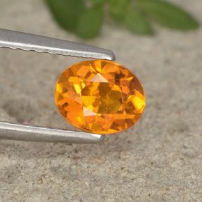 0,62 ctw natürlicher orangefarbener Clinohumit, Oval Schliff, VS-SI