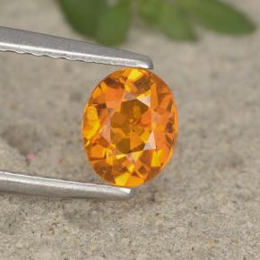 0,62 ctw natürlicher orangefarbener Clinohumit, Oval Schliff, VS-SI