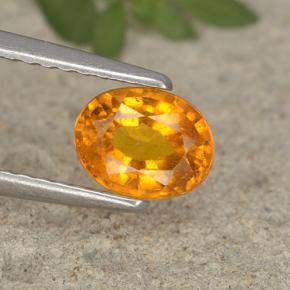 0,91 ctw natürlicher orangefarbener Clinohumit, Oval Schliff, VS-SI