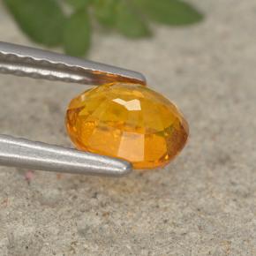 0,91 ctw natürlicher orangefarbener Clinohumit, Oval Schliff, VS-SI