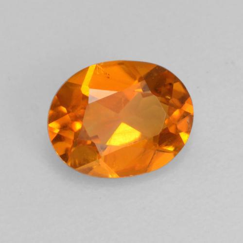 0,52 ctw natürlicher orangefarbener Clinohumit, Oval Schliff, VS-SI