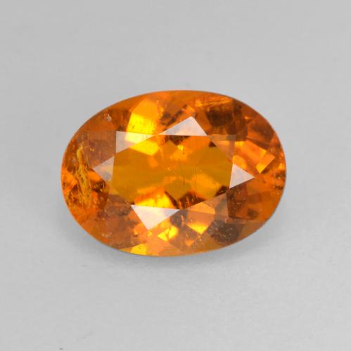 0,82 ctw natürlicher orangefarbener Clinohumit, Oval Schliff, SI