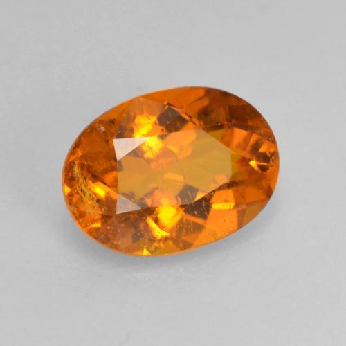 0,82 ctw natürlicher orangefarbener Clinohumit, Oval Schliff, SI