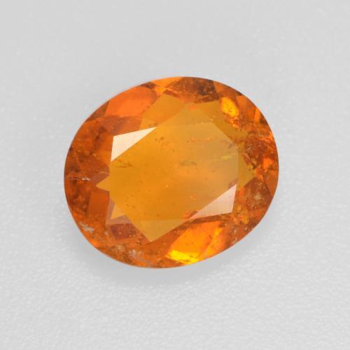 1,45 ctw natürlicher orangefarbener Clinohumit, Oval Schliff, SI
