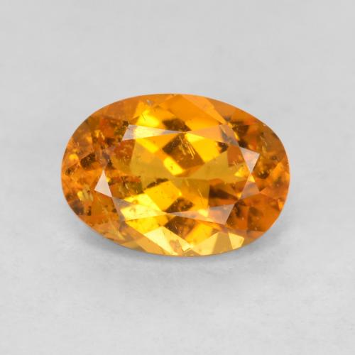0,85 ctw natürlicher orangefarbener Clinohumit, Oval Schliff, SI-I1
