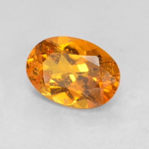 0,85 ctw natürlicher orangefarbener Clinohumit, Oval Schliff, SI-I1