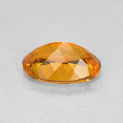 0,85 ctw natürlicher orangefarbener Clinohumit, Oval Schliff, SI-I1
