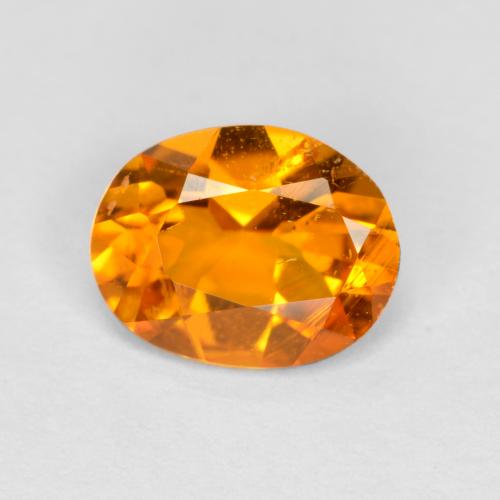 0,68 ctw natürlicher orangefarbener Clinohumit, Oval Schliff, SI