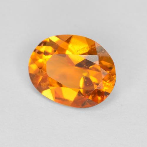 0,68 ctw natürlicher orangefarbener Clinohumit, Oval Schliff, SI