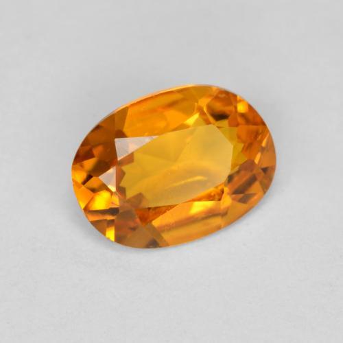 0,41 ctw natürlicher orangefarbener Clinohumit, Oval Schliff, VS