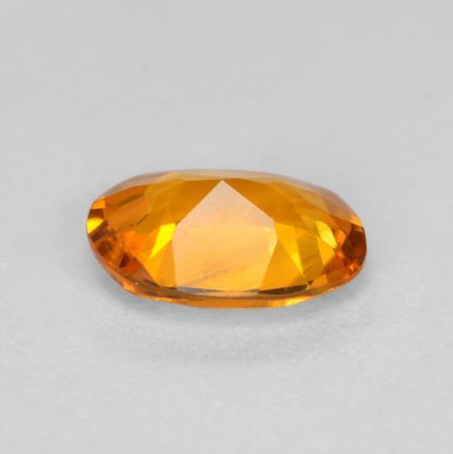 0,41 ctw natürlicher orangefarbener Clinohumit, Oval Schliff, VS