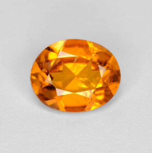 0,54 ctw natürlicher orangefarbener Clinohumit, Oval Schliff, SI