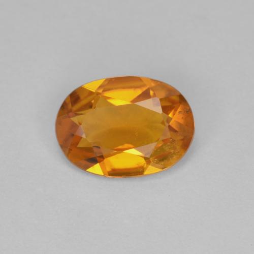 0,90 ctw natürlicher orangefarbener Clinohumit, Oval Schliff, VS-SI