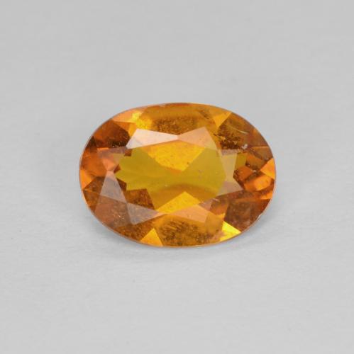 0,94 ctw natürlicher orangefarbener Clinohumit, Oval Schliff, SI