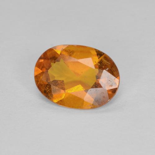 0,94 ctw natürlicher orangefarbener Clinohumit, Oval Schliff, SI