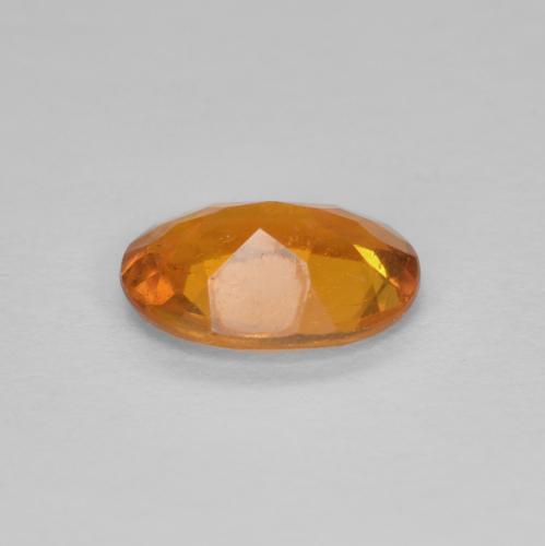 0,94 ctw natürlicher orangefarbener Clinohumit, Oval Schliff, SI
