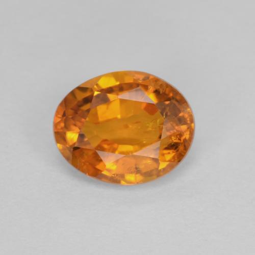 0,91 ctw natürlicher orangefarbener Clinohumit, Oval Schliff, SI