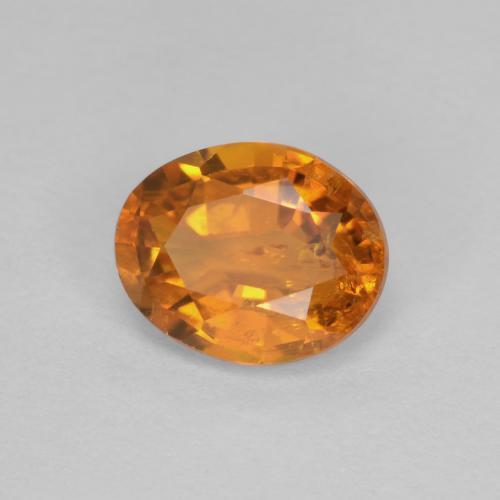 0,91 ctw natürlicher orangefarbener Clinohumit, Oval Schliff, SI