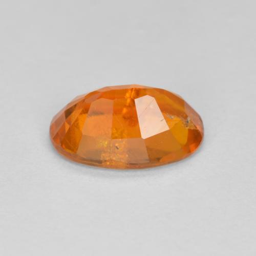 1,19 ctw natürlicher orangefarbener Clinohumit, Oval Schliff, SI-I1