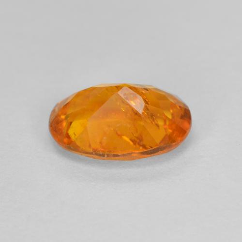 1,26 ctw natürlicher orangefarbener Clinohumit, Oval Schliff, SI-I1
