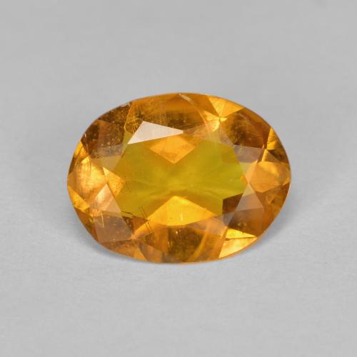 1,33 ctw natürlicher orangefarbener Clinohumit, Oval Schliff, SI