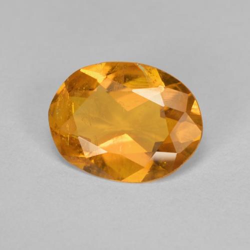 1,33 ctw natürlicher orangefarbener Clinohumit, Oval Schliff, SI