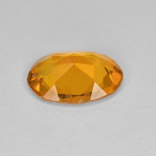 1,33 ctw natürlicher orangefarbener Clinohumit, Oval Schliff, SI