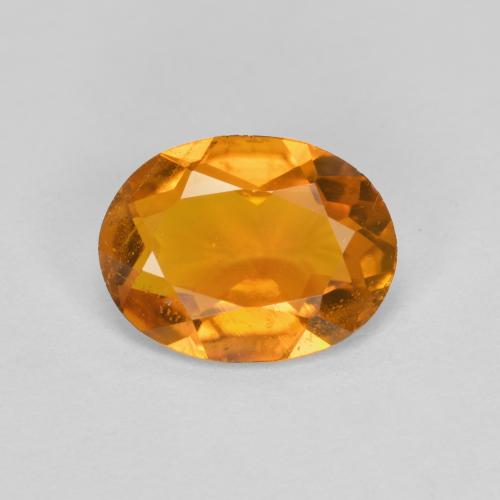 1,34 ctw natürlicher orangefarbener Clinohumit, Oval Schliff, SI