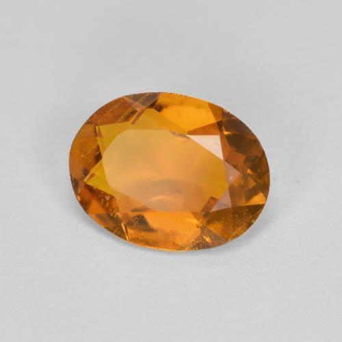 1,34 ctw natürlicher orangefarbener Clinohumit, Oval Schliff, SI