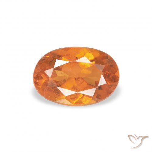 0.57ct Natürlicher Mittelorange Klinohumit, Oval, SI