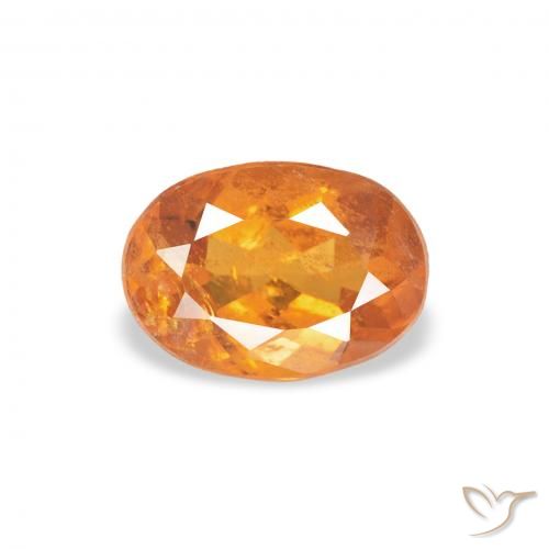0.76ct Natürlicher rötlich-orange Klinohumit, Oval, SI