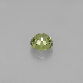 0,61 ctw natürlicher grüner Demantoid, Rundschliff, VS-SI
