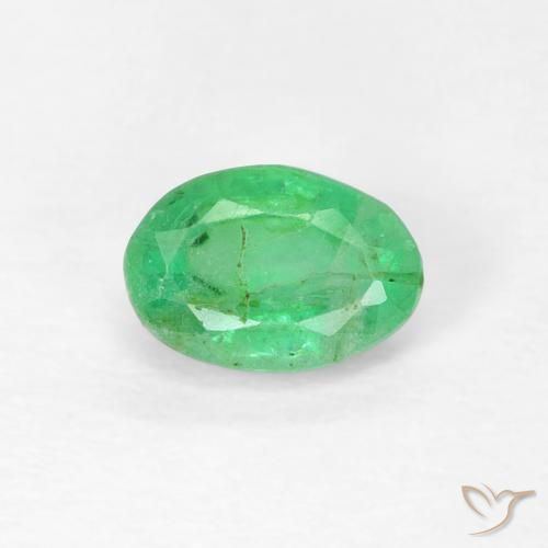 0.57ct Natürlicher gelblich-grün Smaragd, Oval, SI, Photo A
