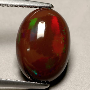 3,60 ctw natürlicher mehrfarbiger Feueropal, Oval Schliff, Lichtundurchlässig
