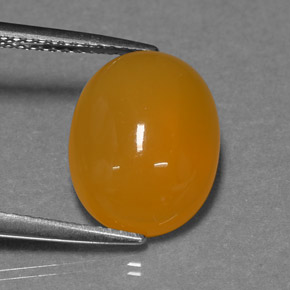 3,93 ctw natürlicher orangefarbener Feueropal, Oval Schliff, Lichtdurchlässig